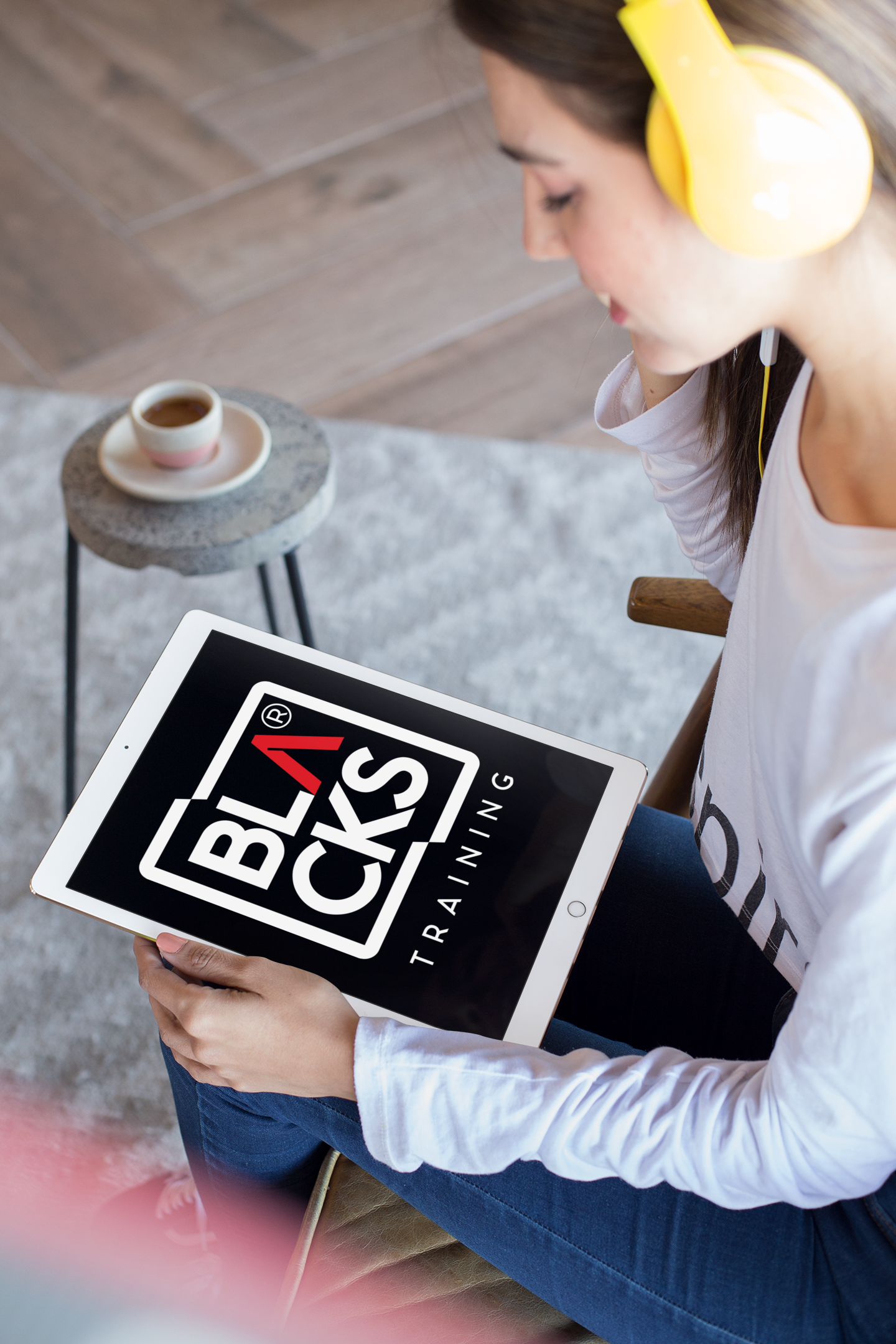 mockup-of-a-woman-listening-to-a-podcast-on-an-ipad-pro-24792 (1)